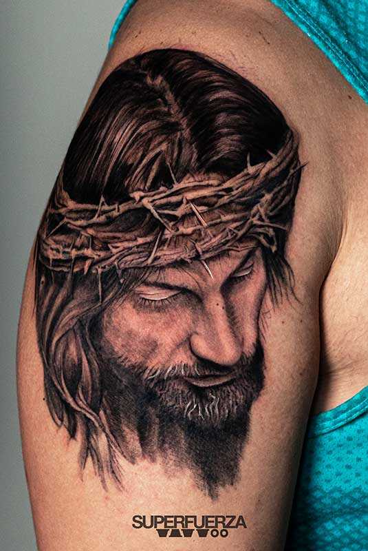 Jesucristo Realista final tribal tattoo and piercing