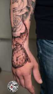 real clock tattoo by Superfuerza Tattoo final tribal & piercing