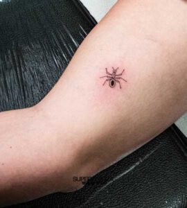ant fine tattoo by Superfuerza Tattoo final tribal & piercing