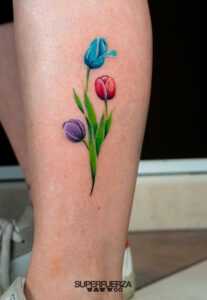 Final Tribal Tattoo piercing tulipan color superfuerza tattoo sergio camporota